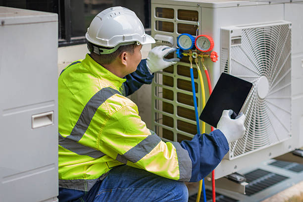 Professional Hvac technician working in Mansfield, MA